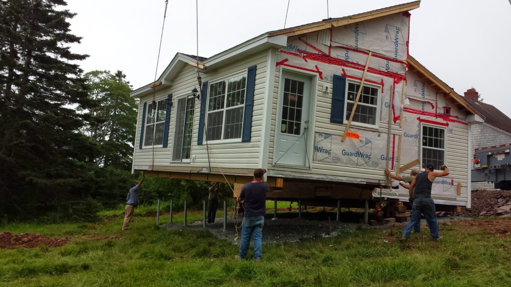 Home in the slings. This is a manufactured home. Two pieces to be installed.
